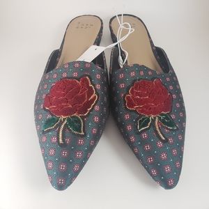 A new day pointed toe open back flats size 8.5